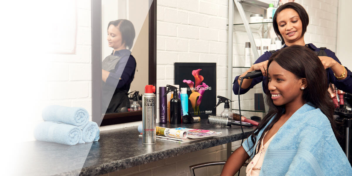 Lady in salon getting her hair done
