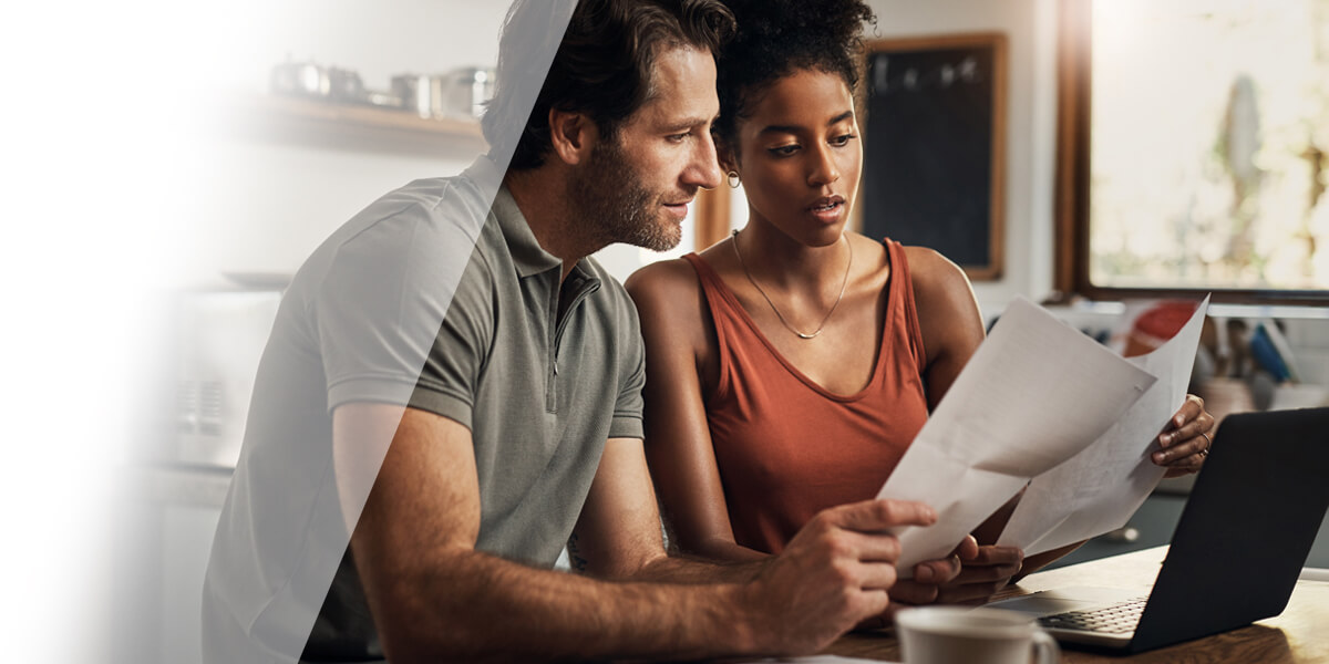 Man and woman looking at paper