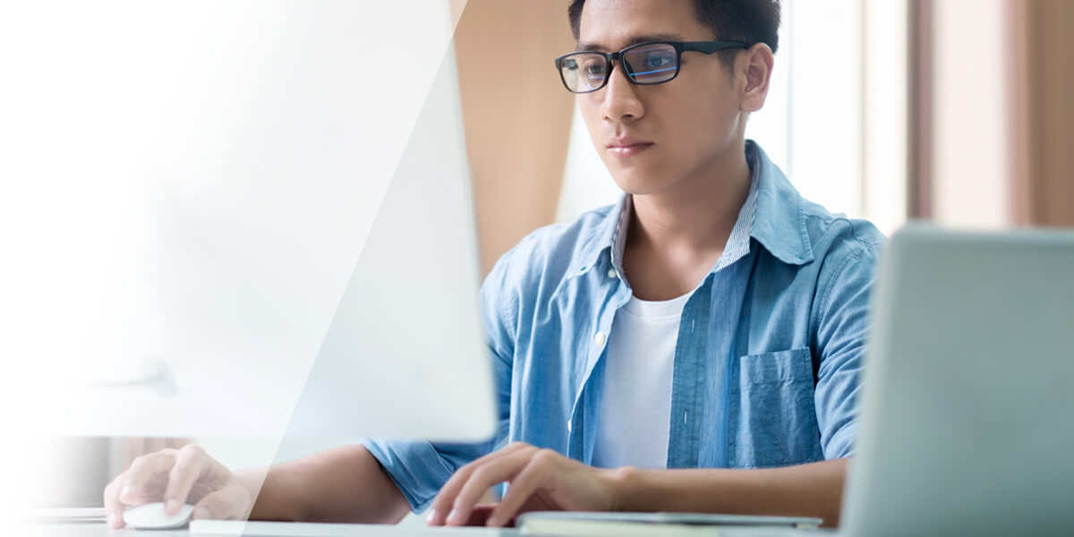 Man sitting on desk working